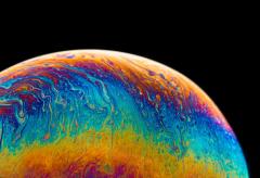 multicolored planet fluid painting